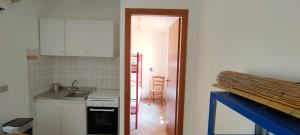 Kuchyň nebo kuchyňský kout v ubytování Casa Vacanze Abeautifulplace + 34 fotografií