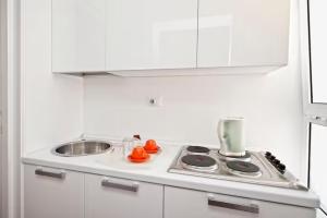 A kitchen or kitchenette at Romacentrarte