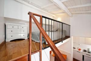 A bed or beds in a room at Romacentrarte