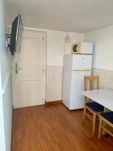 A kitchen or kitchenette at Romacentrarte