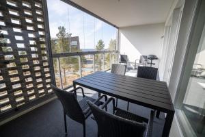 En balkon eller terrasse på Rantakallan Jäkälähovi