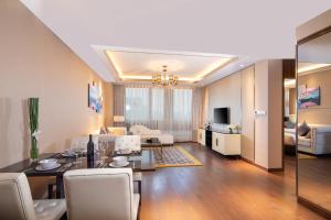 Sjónvarps- og/eða afþreyingartæki á Rocase Boutique Hotel Wuxi
