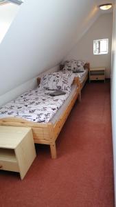 Postel nebo postele na pokoji v ubytování Apartmán Dobrá mysl