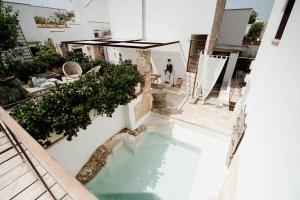 Bazén v ubytování Corte 14.15 - Apartments with terrace and pool nebo v jeho okolí