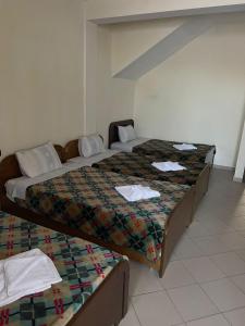Postel nebo postele na pokoji v ubytování Hotel Saint Marena