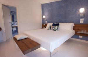 Postel nebo postele na pokoji v ubytování Aquamaris Design Suite & Spa