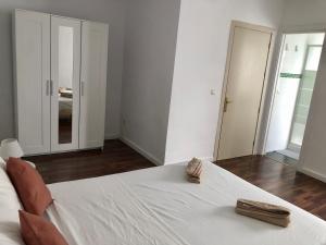 A bed or beds in a room at Apartamento del Mar