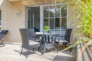 Patio nebo venkovní prostory v ubytování fewo1846 - Strandresidenz Wassersleben Meeresbrise App 685 - komfortables Apartment mit Balkon und Meerblick