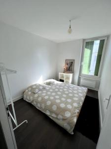 Postel nebo postele na pokoji v ubytování Superbe Appartement lumineux proche tramway