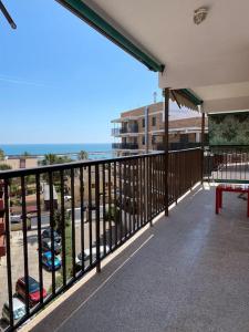 a balcony with a view of the ocean at Brisa Marina in Las Canteras
