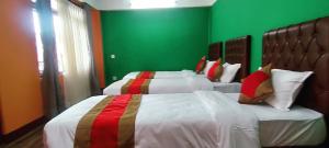 Voodi või voodid majutusasutuse Nepalaya Home Hostel toas