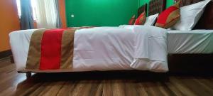 Voodi või voodid majutusasutuse Nepalaya Home Hostel toas