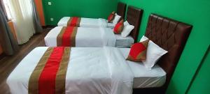 Voodi või voodid majutusasutuse Nepalaya Home Hostel toas