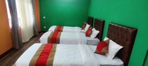 Voodi või voodid majutusasutuse Nepalaya Home Hostel toas