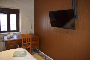 Μια τηλεόραση ή/και κέντρο ψυχαγωγίας στο CASA RUINA