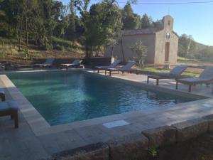 The swimming pool at or close to Bergerie du Prunelli