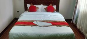 Voodi või voodid majutusasutuse Nepalaya Home Hostel toas