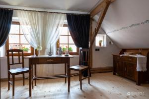 Posezení v ubytování Notranjska hiša - traditional country house, close to the world attraction Cerknica lake
