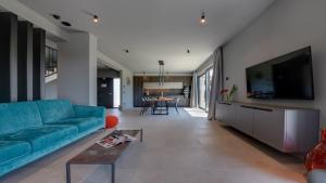 TV a/nebo společenská místnost v ubytování Modern and stylish villa in Vodnjan