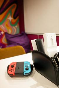 Fotografie z fotogalerie ubytování Capsule Groovy-Jacuzzi-Sauna-Billard-Netflix- Nintendo Switch & Jeux v destinaci Mons