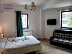 Postel nebo postele na pokoji v ubytování Adrys Boutique Villa