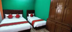 Voodi või voodid majutusasutuse Nepalaya Home Hostel toas