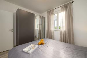 Ein Bett oder Betten in einem Zimmer der Unterkunft Villa E by IstriaLux