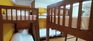 Voodi või voodid majutusasutuse Nepalaya Home Hostel toas
