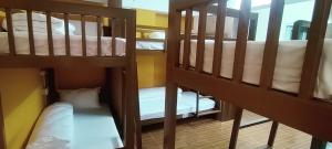 Voodi või voodid majutusasutuse Nepalaya Home Hostel toas
