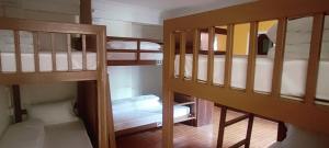 Voodi või voodid majutusasutuse Nepalaya Home Hostel toas