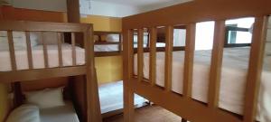 Voodi või voodid majutusasutuse Nepalaya Home Hostel toas
