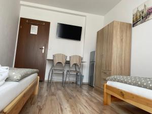 Μια τηλεόραση ή/και κέντρο ψυχαγωγίας στο Różana 51