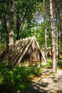 a tent in the middle of a forest at LONGOSPHERE GLAMPING in Kırklareli