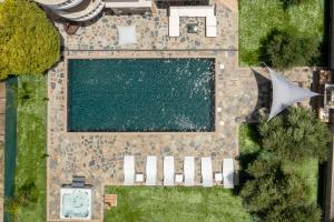 an overhead view of a swimming pool in a yard at Sun Dream Villa in Ialyssos