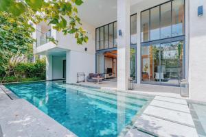 an image of a swimming pool in a house at Baba Beach Club Hua Hin Luxury Pool Villa by Sri panwa in Cha Am