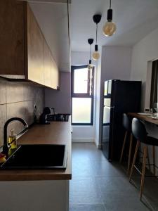 ครัวหรือมุมครัวของ Onix - Nordic Studio Apartment 3, Premium Parking