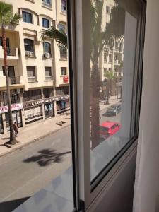 a view of a city street from a window at Joli Studio au Centre Ville avec WIFI - Netflix in Casablanca
