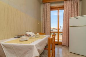 Kuchyň nebo kuchyňský kout v ubytování Hotel Elman