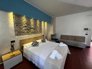 Postel nebo postele na pokoji v ubytování Il Quadrifoglio B&B
