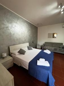Posteľ alebo postele v izbe v ubytovaní Il Quadrifoglio B&B