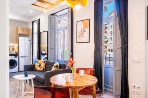 Area soggiorno di Classy Studio Apartment with Unique Design