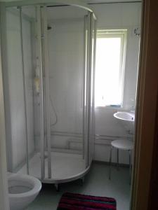 a bathroom with a shower and a sink at Lunheim in Geiranger in Geiranger