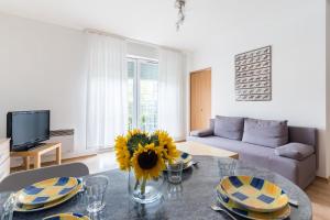 Telewizja i/lub zestaw kina domowego w obiekcie Imperial Apartments - Baltica