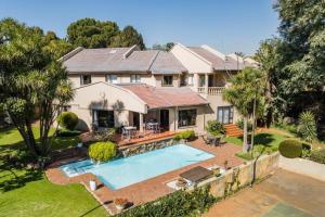 an aerial view of a house with a swimming pool at The Bedford View Guest House in Germiston