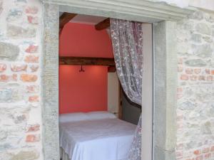 A bed or beds in a room at Apartment in Casola near Torre di Casola Még 32 kép