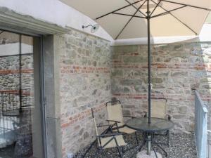 A patio or other outdoor area at Apartment in Casola near Torre di Casola