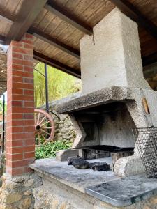 an outdoor oven with two seals sleeping in it at DOLCE VITA CIAIXE in Camporosso