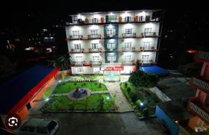 Budova, kde se hotel nachází + 1 fotografie
