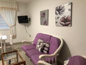 TV a/nebo společenská místnost v ubytování Apartamentos Raxo Mar