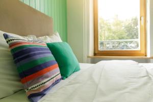 Letto o letti in una camera di Hôtel de l'Ange